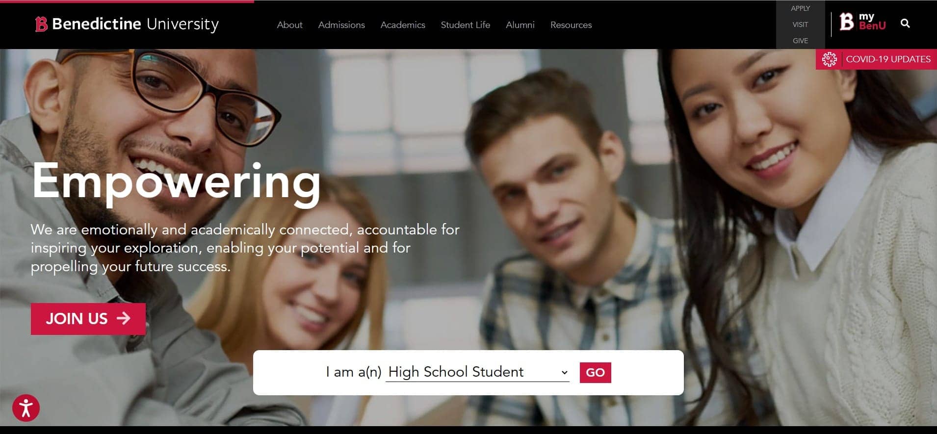 screenshot-web.archive.org-2024.05.17-12_07_58 Homepage banner of Benedictine University featuring three smiling young adults. The headline reads "Empowering," with text about emotional and academic connection, potential, and future success, and a "Join Us" call-to-action button alongside a dropdown menu titled "I am a(n) High School Student" with a "GO" button. Top navigation includes options such as About, Admissions, Academics, and a COVID-19 updates link.